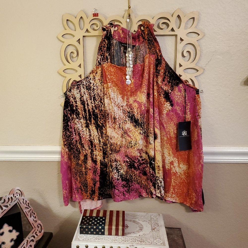 A NWT oversized, long, sleeveless top